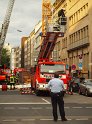 Person auf Baukran Koeln Christophstr P086